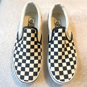 Black and white checkered slip on vans